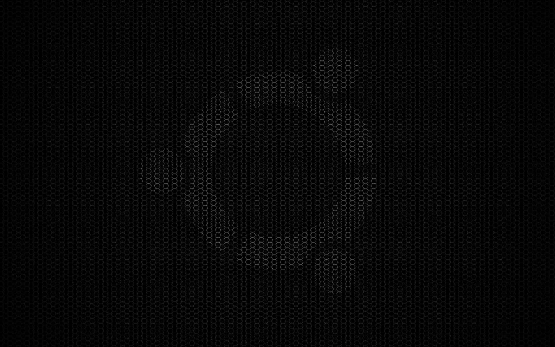 A Black Background With A Circle On It