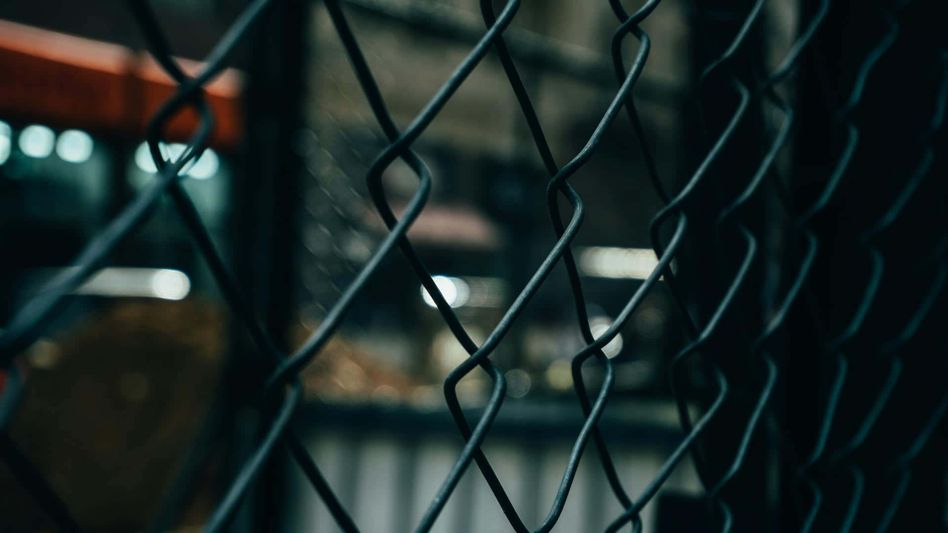 Dark Moody Chainlink Fence Blur Wallpaper