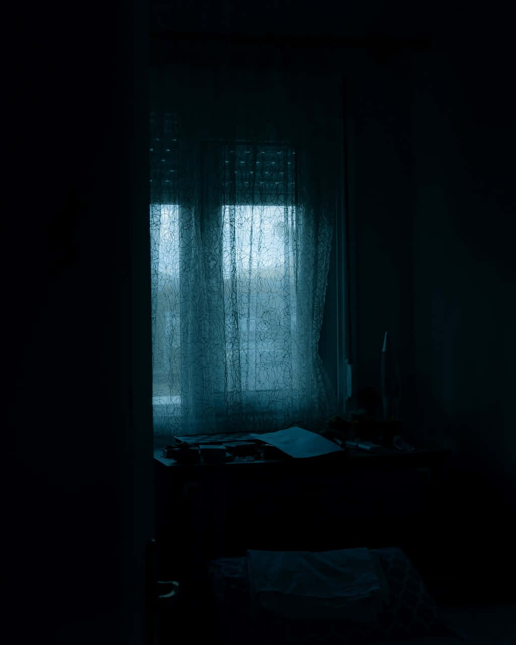 Dark Moody Roomwith Window Curtains Wallpaper