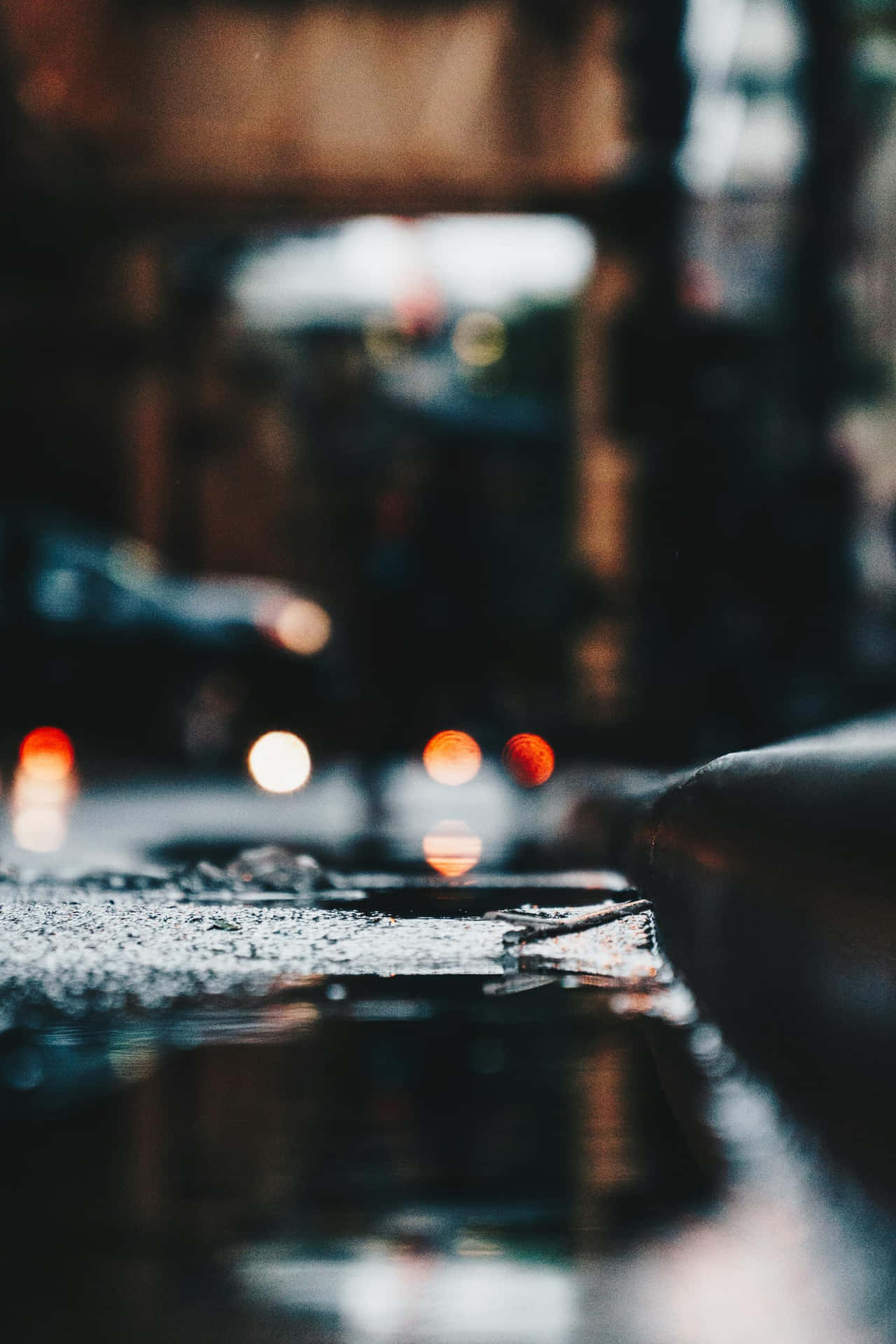 Dark Moody Urban Rain Puddle Wallpaper