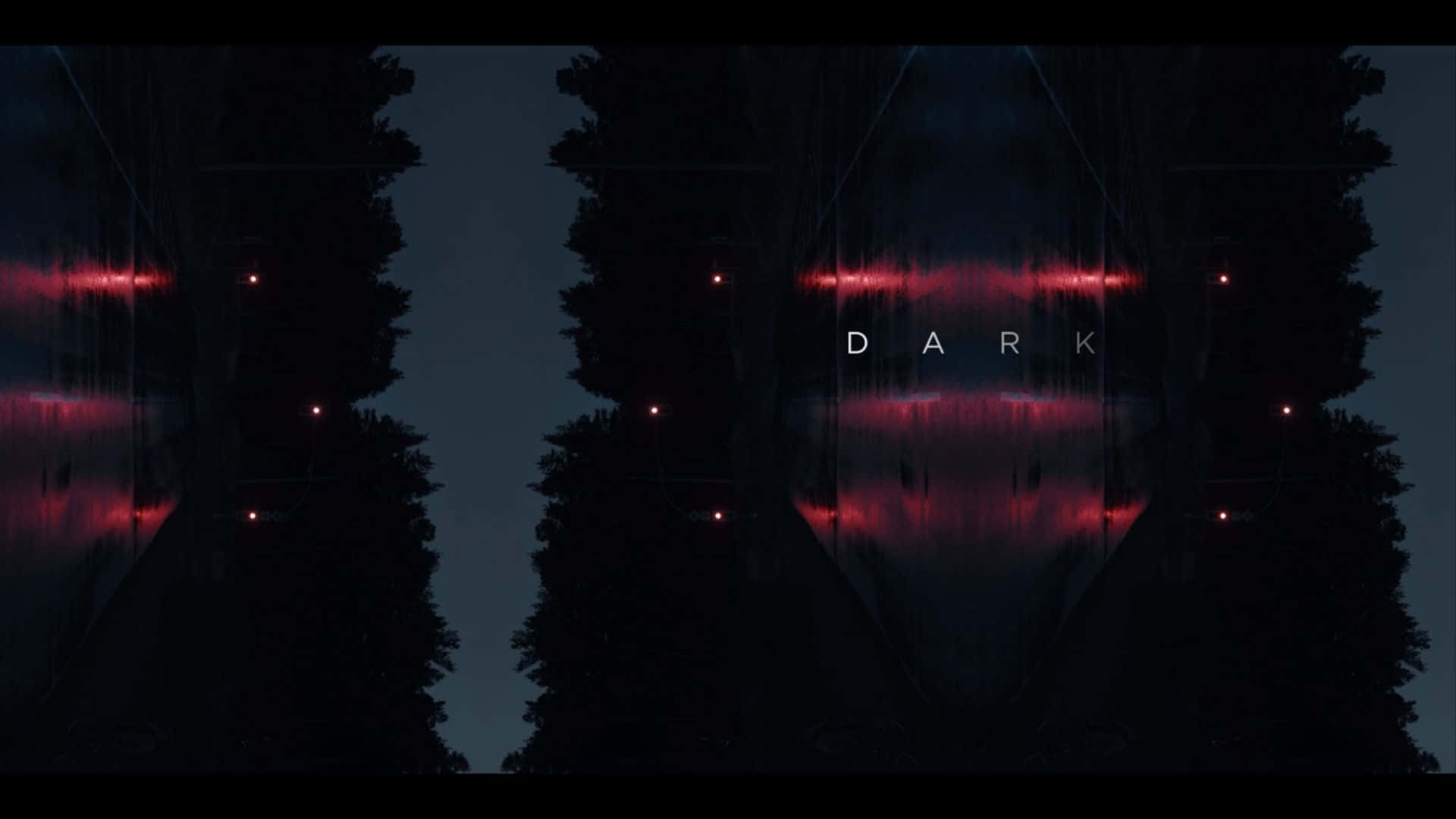 Dark - A Dark Forest With Red Lights Wallpaper
