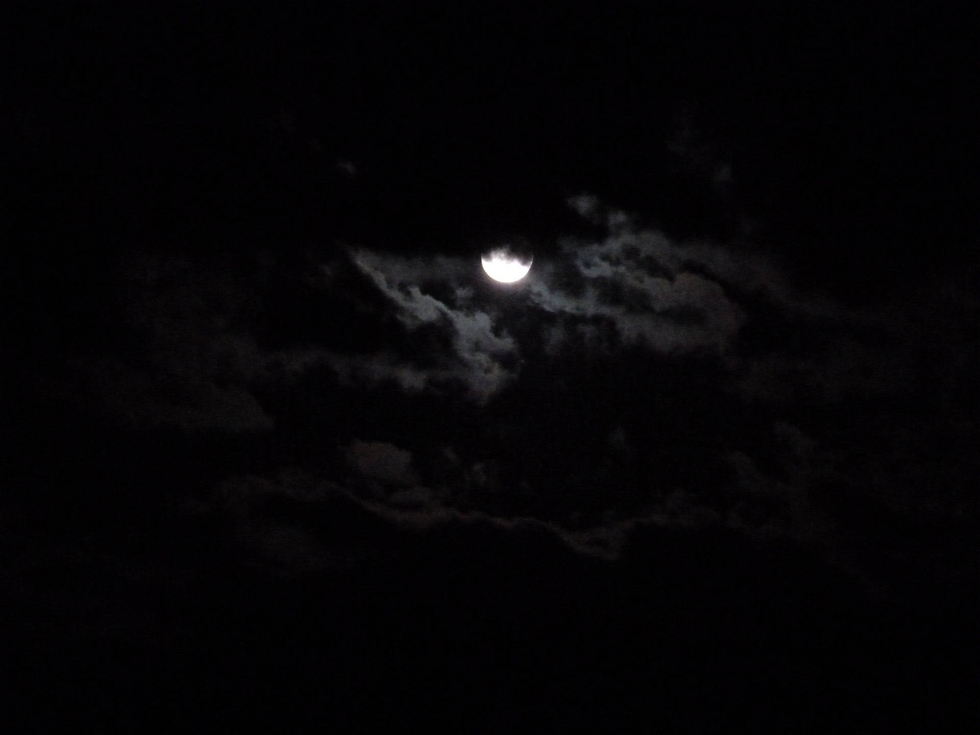 Dark Night Moon Hiding In Clouds Wallpaper