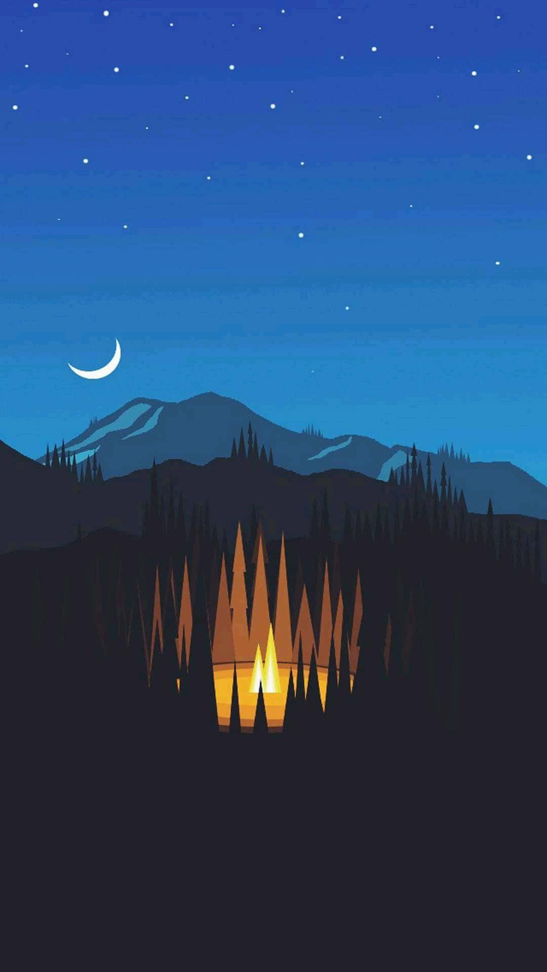 A Campfire In The Mountains At Night