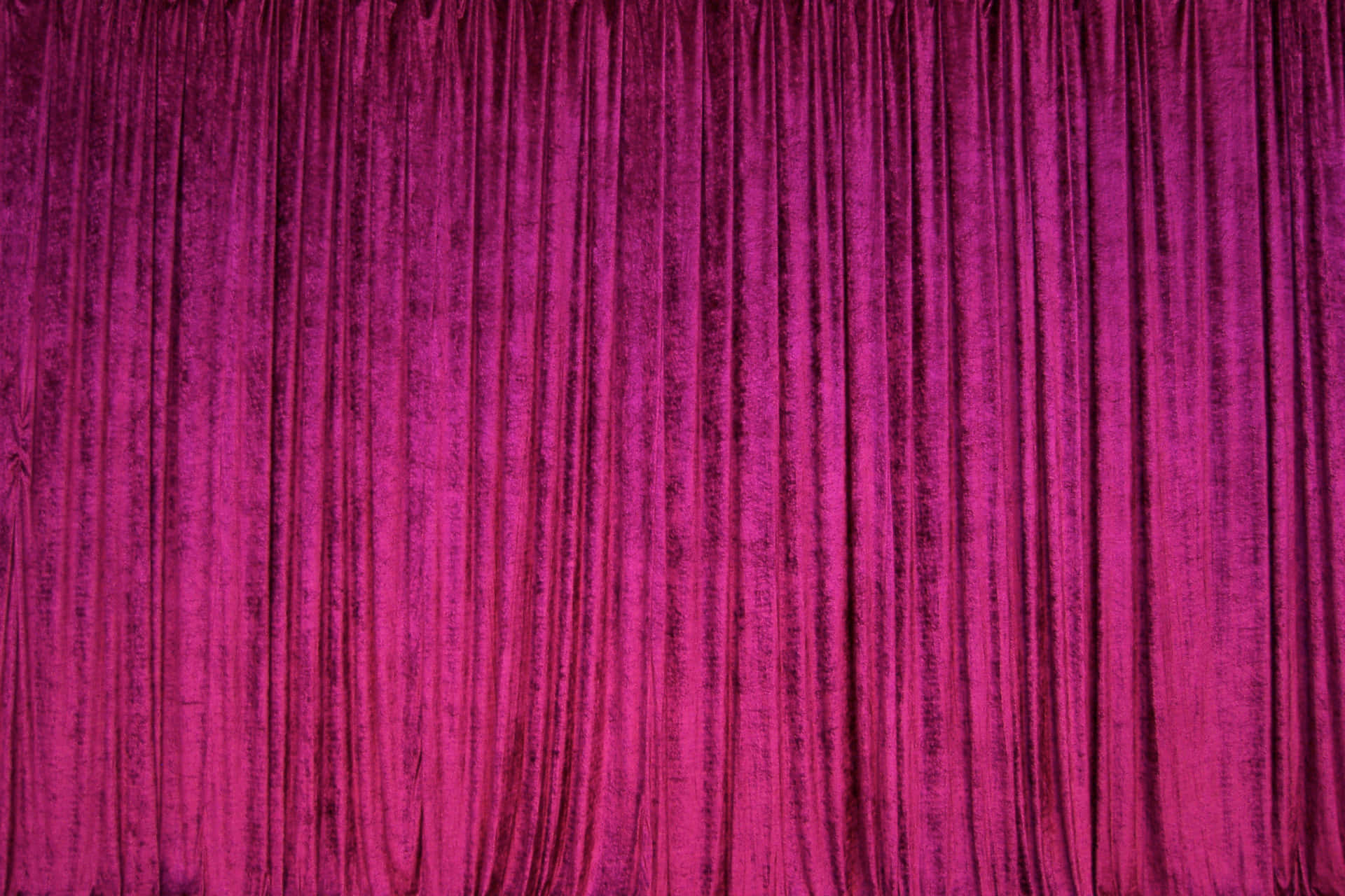 A Purple Velvet Curtain With A Red Background