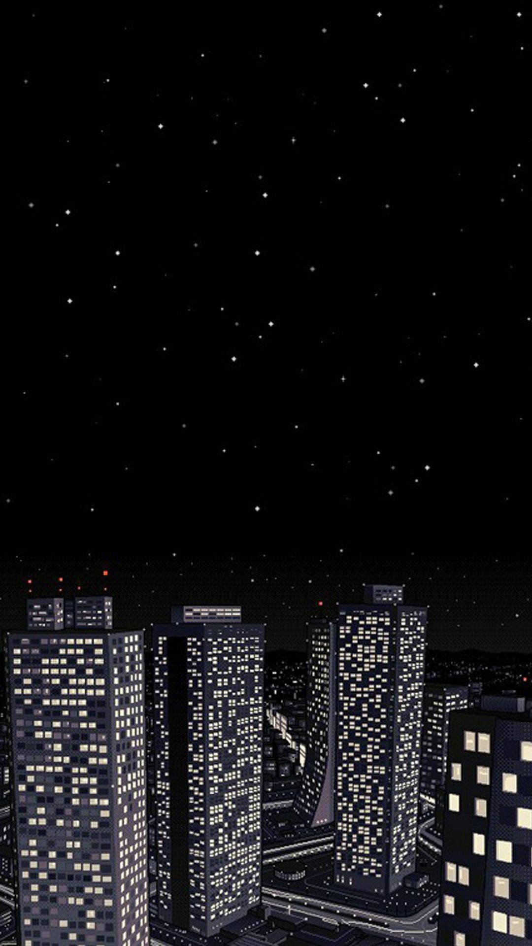 A City With Buildings And A Night Sky Wallpaper