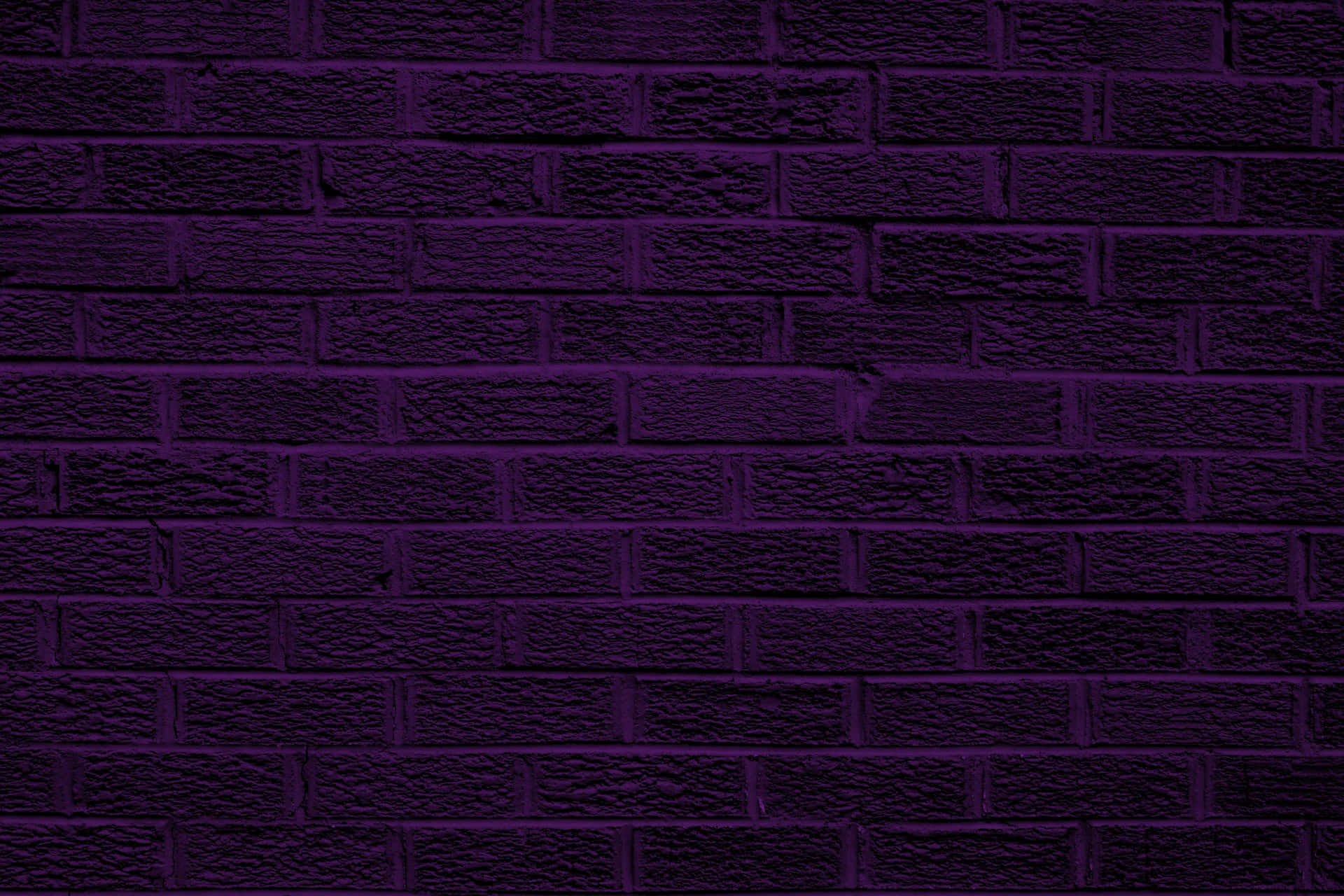 A captivating dark purple background providing a mysterious yet serene atmosphere.