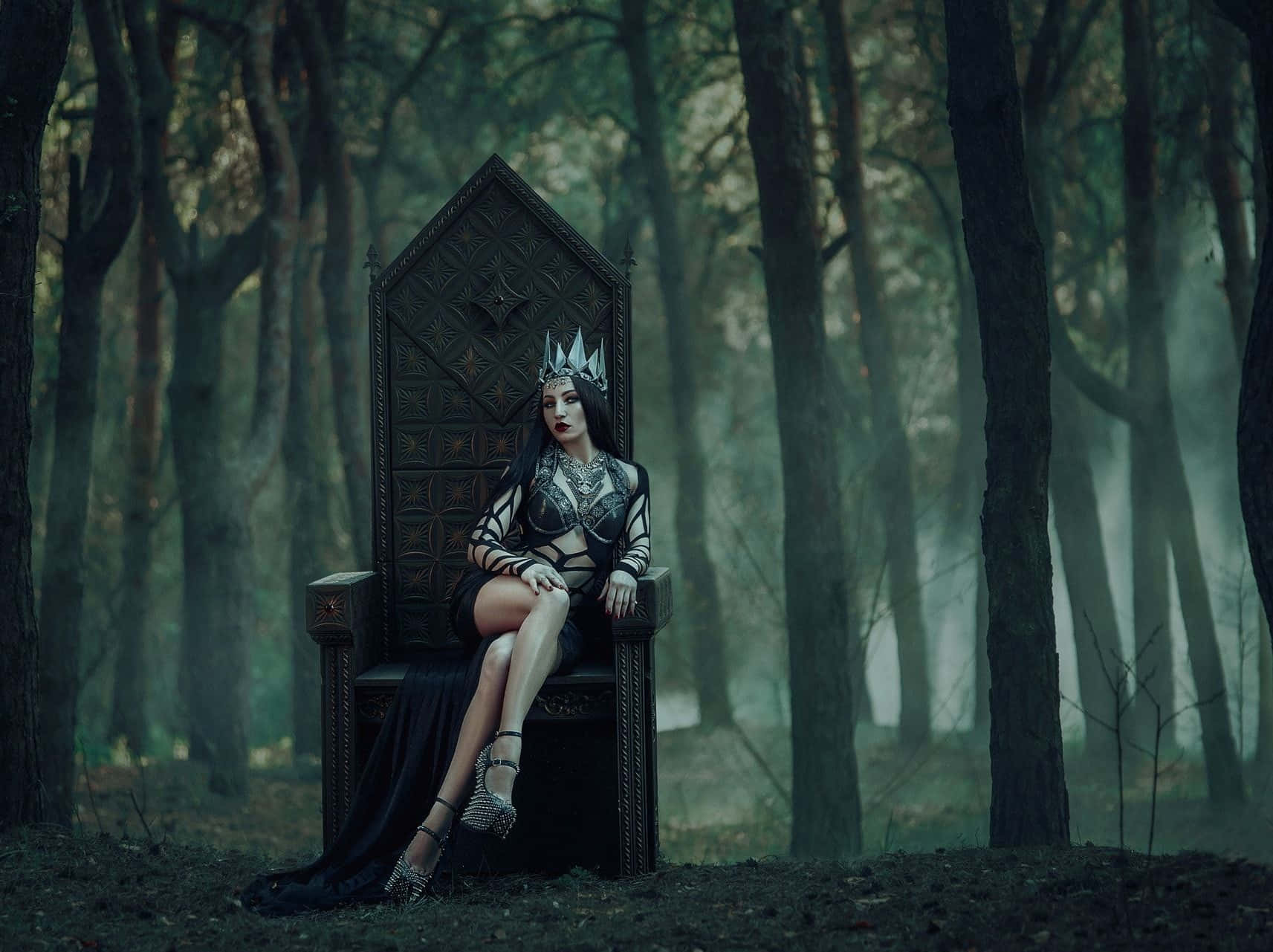 Dark Queen in a Mysterious Forest Wallpaper