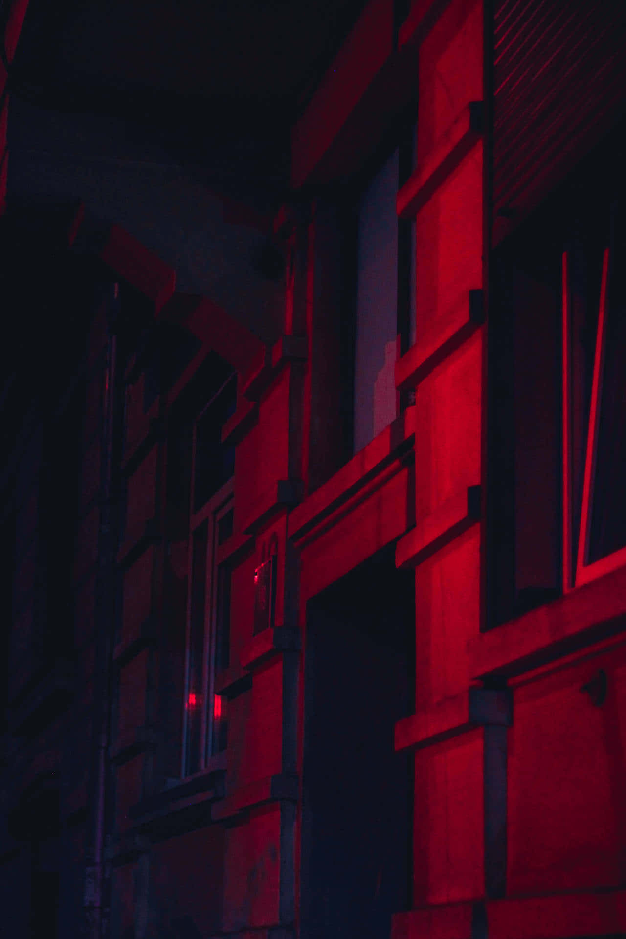 Embrace the Bold and Mysterious Dark Red Aesthetic Wallpaper