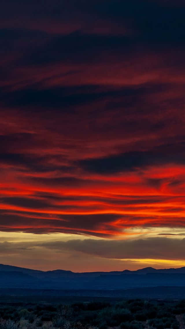 Nuvolaal Tramonto Rosso Scuro Sfondo