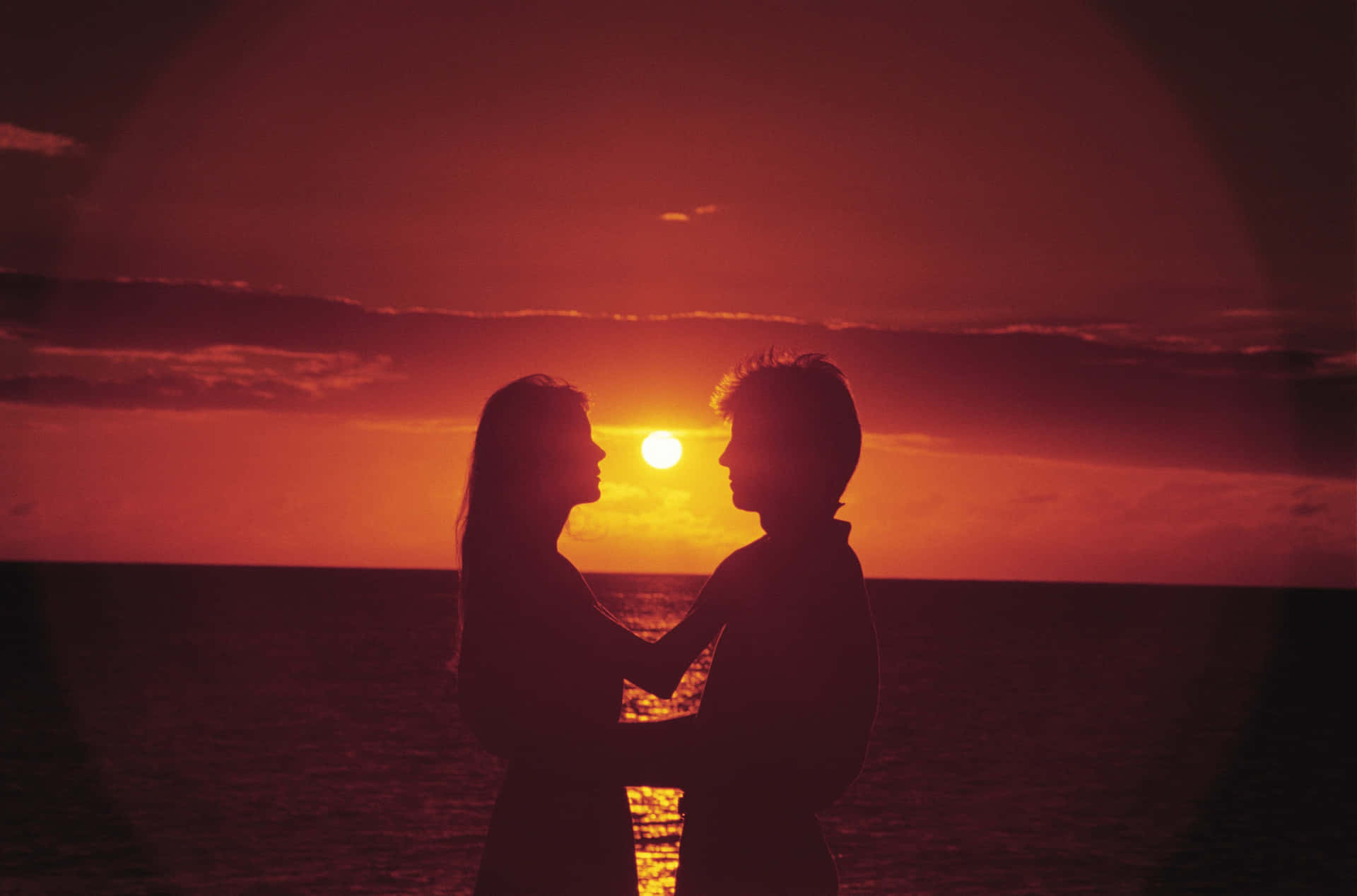 Dark Red Sunset Couple Wallpaper