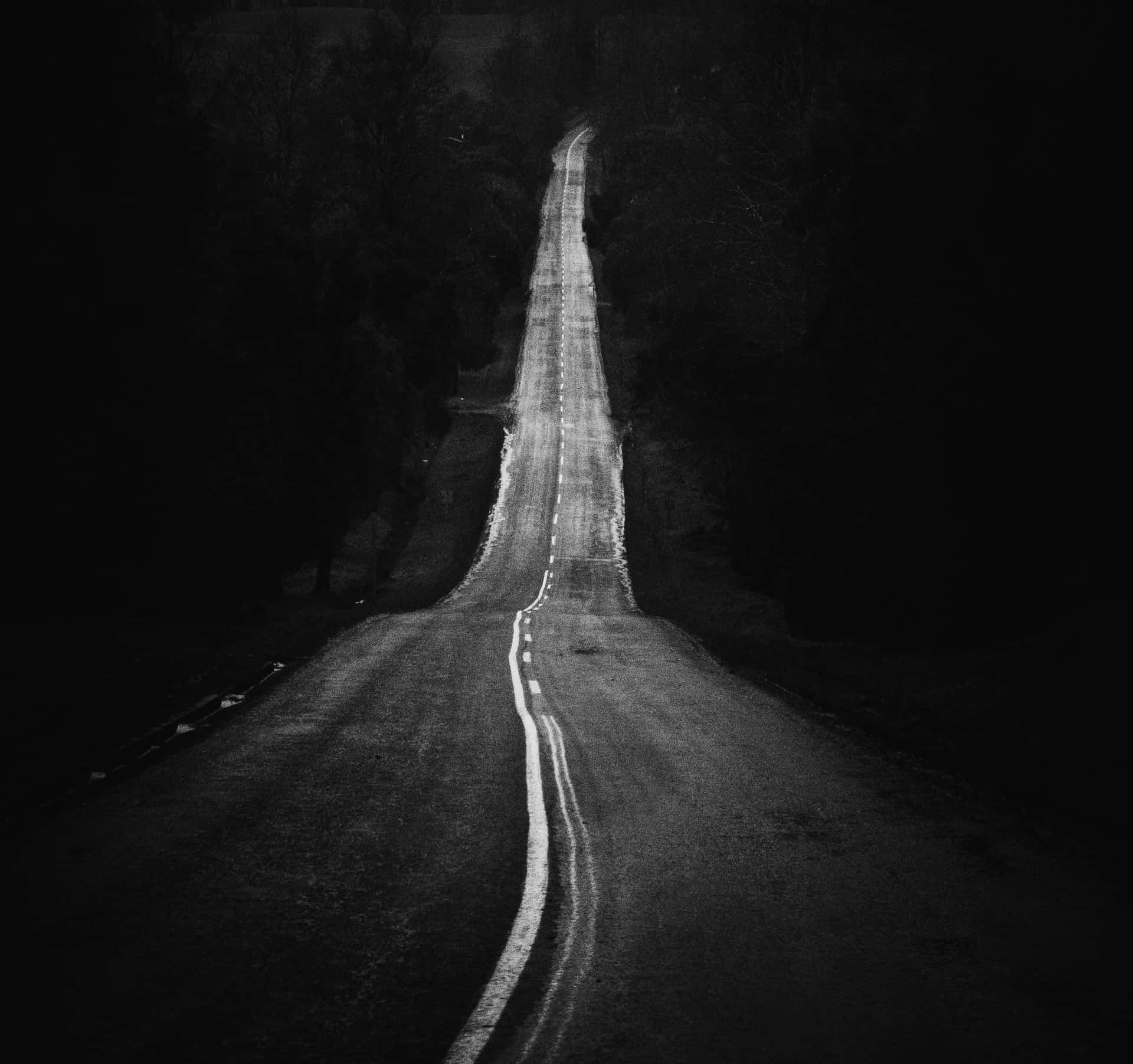 Dark and Mysterious Road at Night Wallpaper