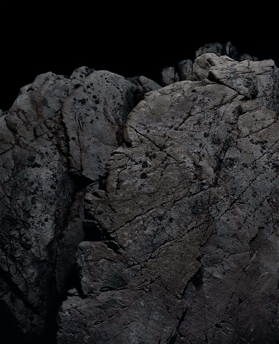 Enigmatic Dark Rock Formation Wallpaper