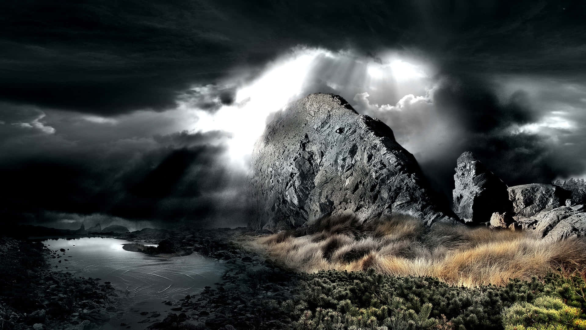 Dark Rock Formation Against a Stormy Sky Wallpaper