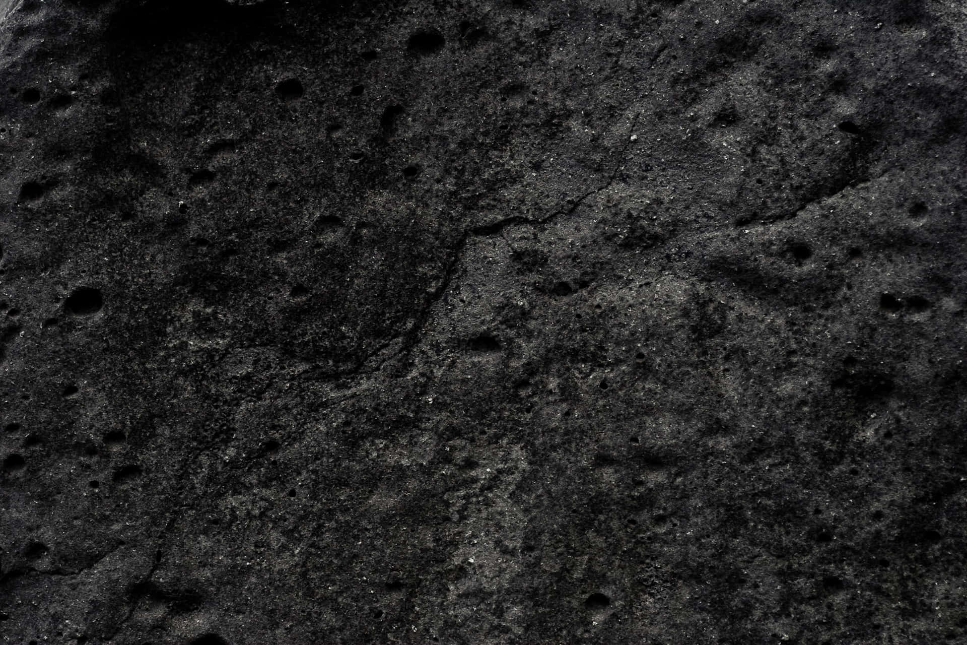 Mysterious Dark Rock Formation Wallpaper