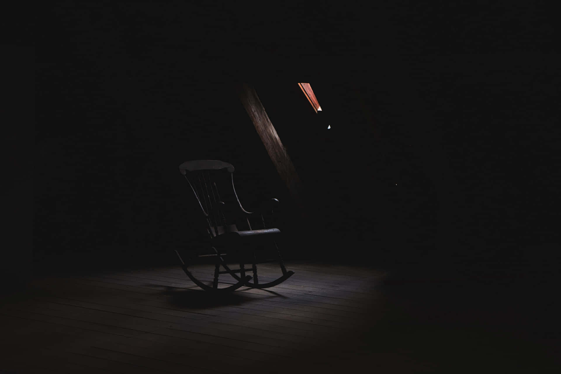 Mysterious Dark Room with Minimal Light Wallpaper