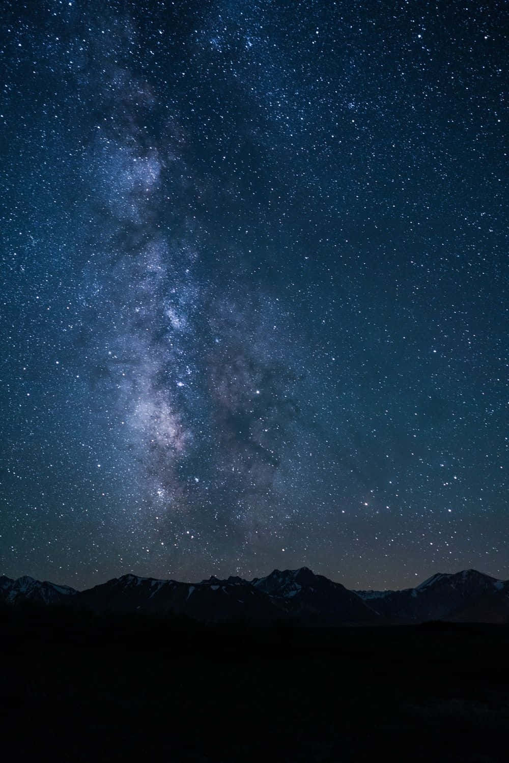 Enchanting Dark Sky Illuminated by Stars Wallpaper
