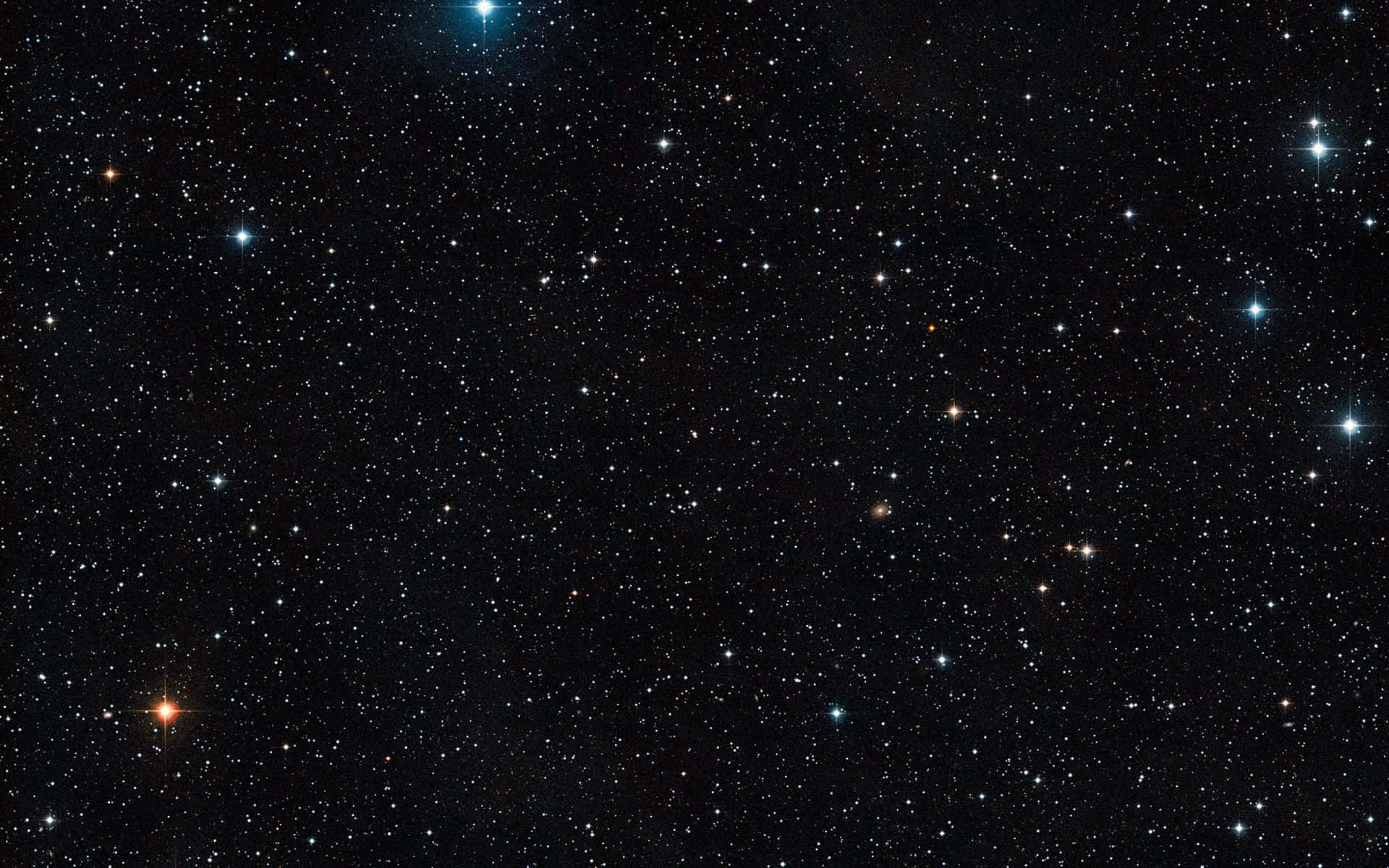 Espaciooscuro Con Estrellas Azules Y Rojas Brillantes. Fondo de pantalla