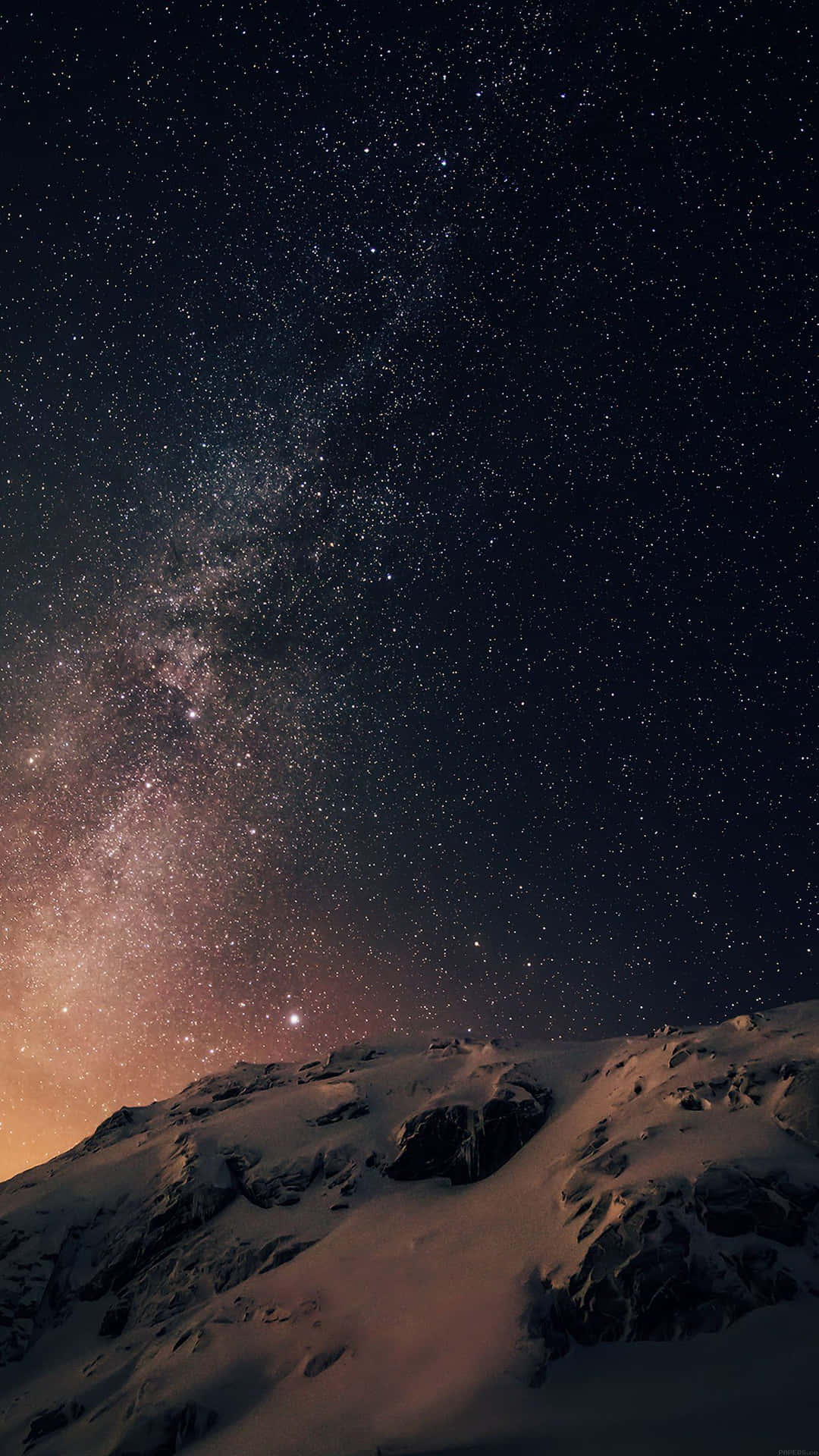 "Gaze into the starry night for a mesmerizing view of the dark sky." Wallpaper