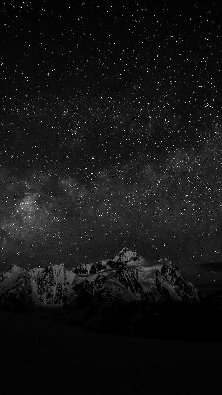 Dark Starry Night Over Snow Mountain Wallpaper