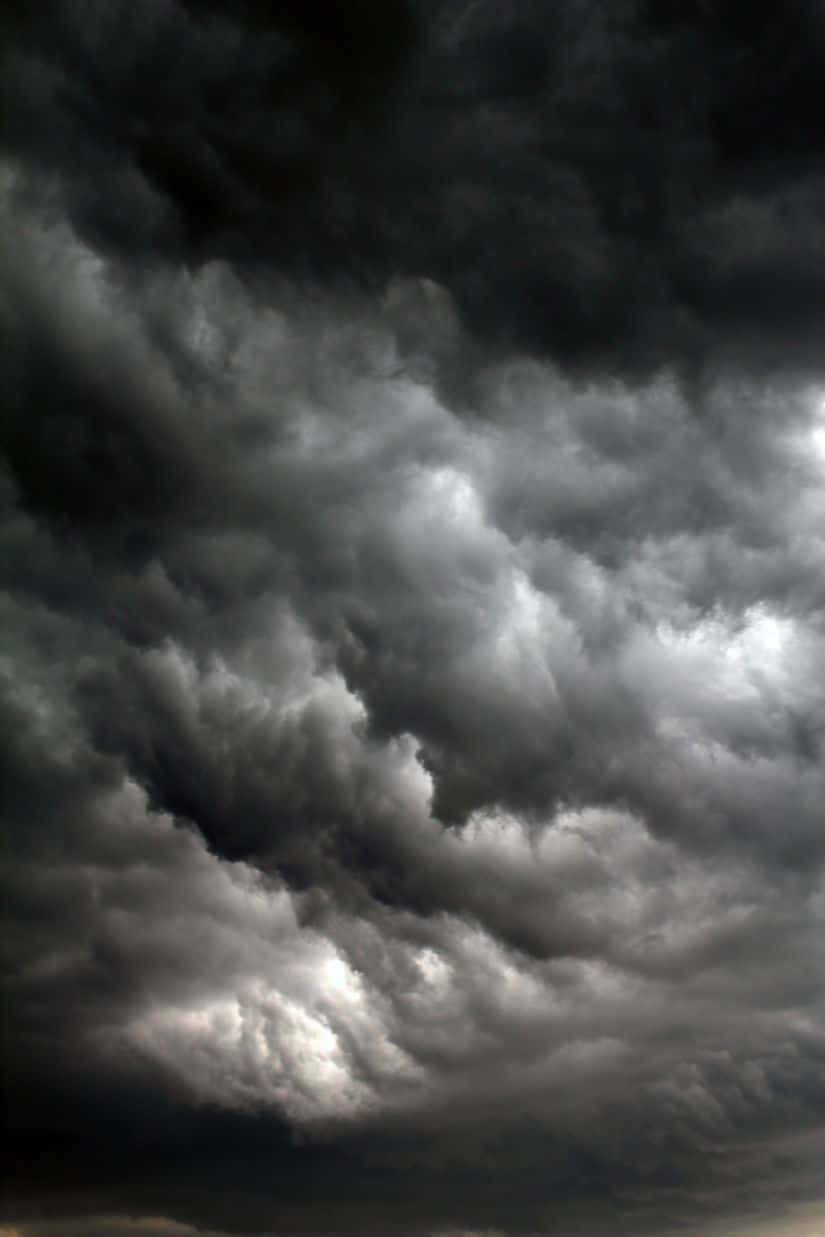 Caption: Intense Dark Storm Approaching Wallpaper