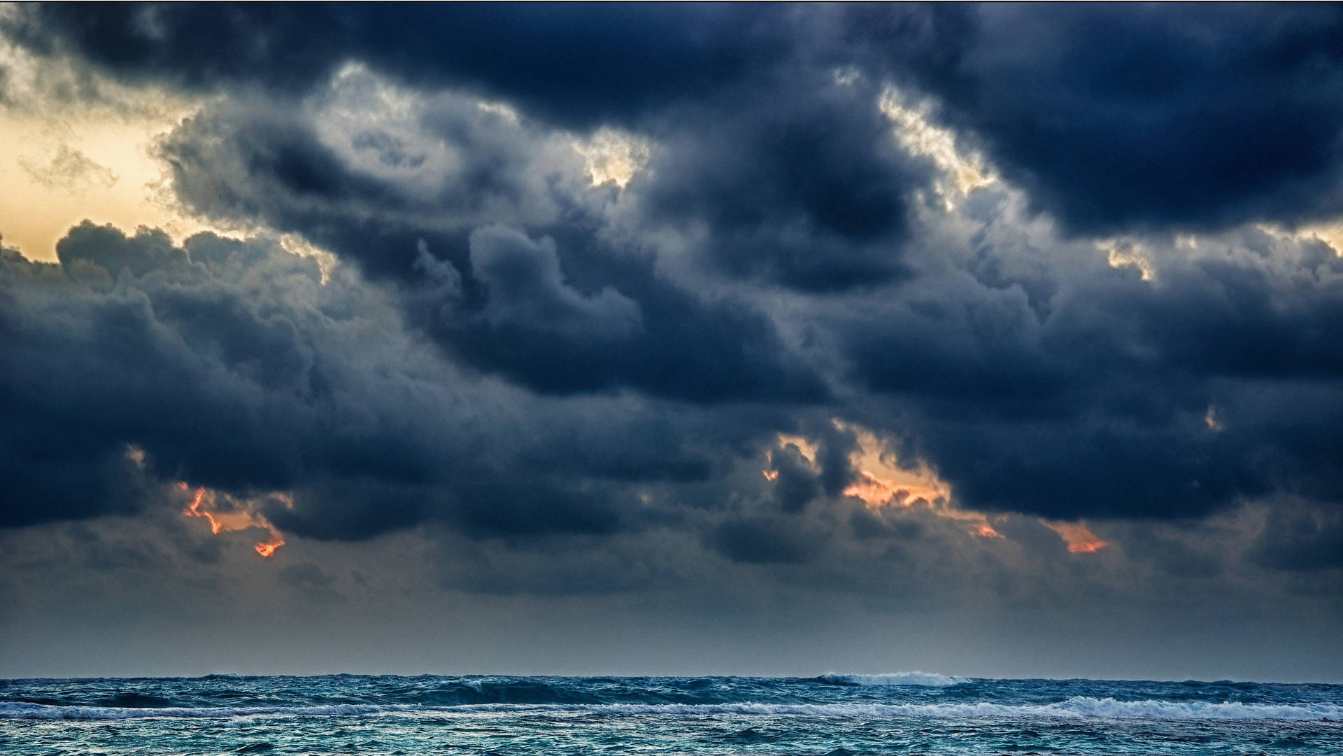 Dark Storm Clouds At Sea Wallpaper