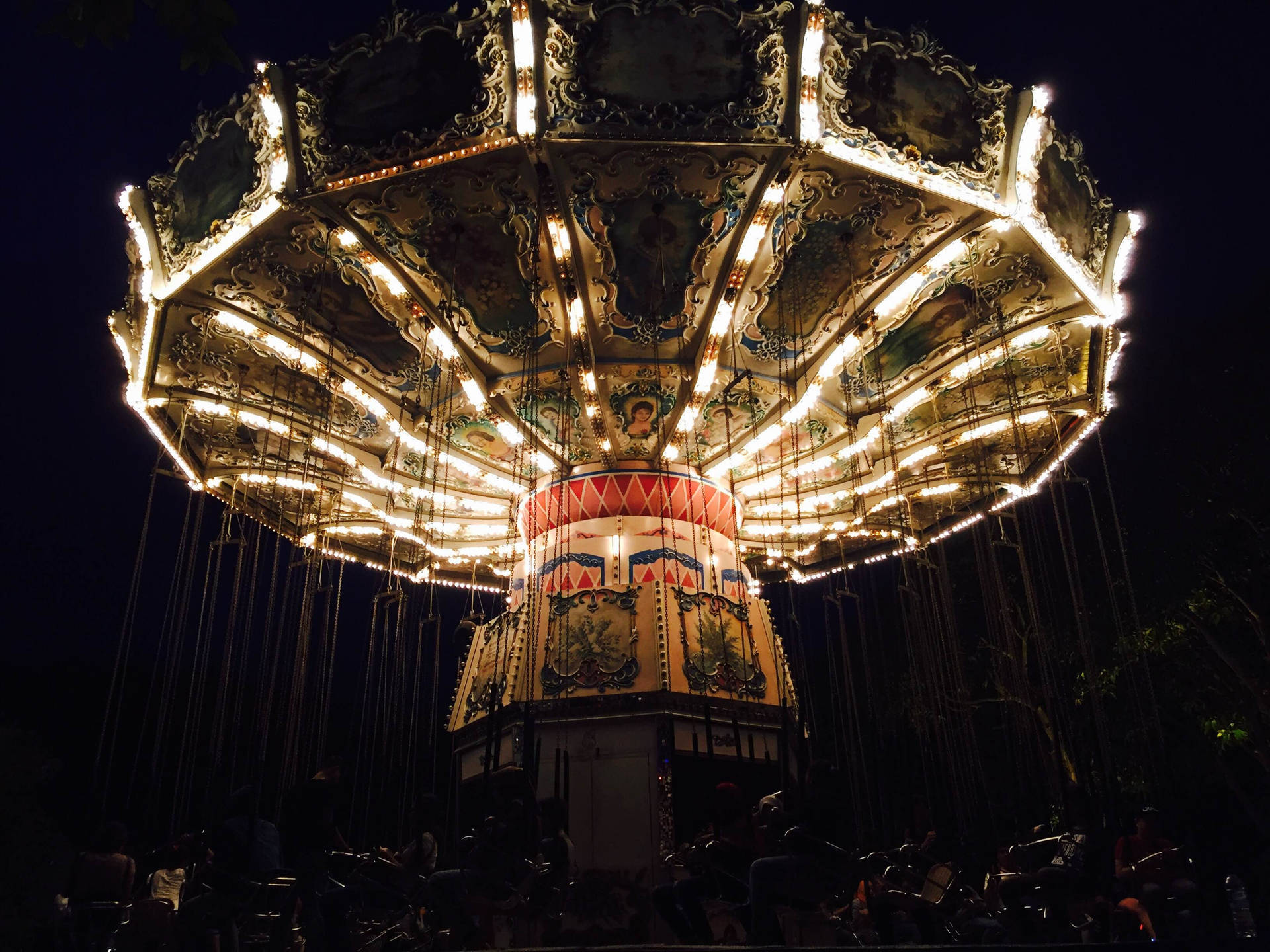 Dark Theme Carousel Ride At Night Wallpaper