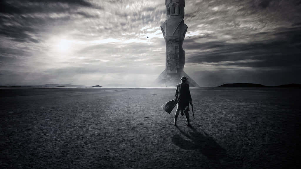 Enigmatic Dark Tower rises in a desolate landscape Wallpaper
