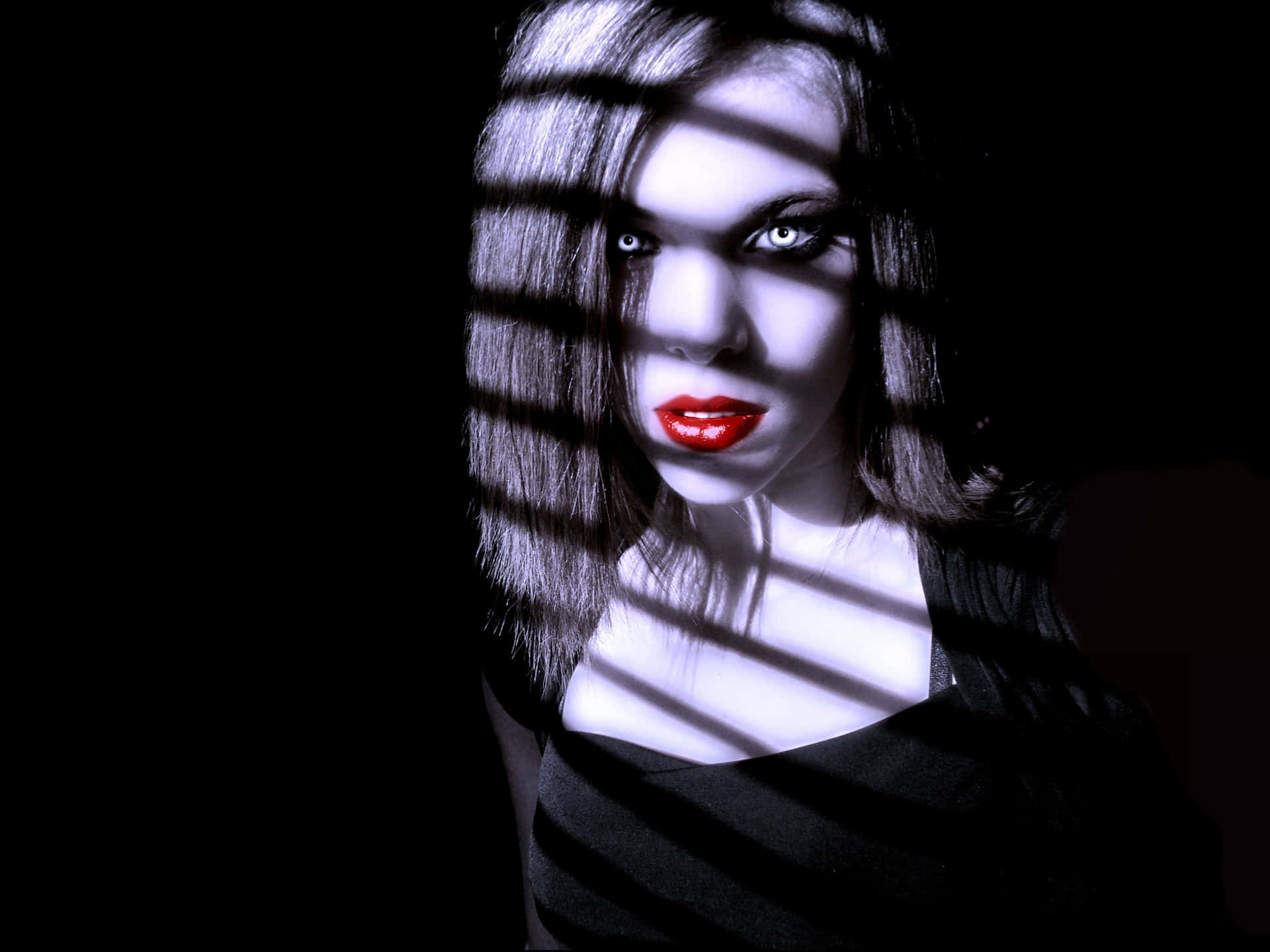 Mysterious Dark Vampire Lurking in the Shadows Wallpaper