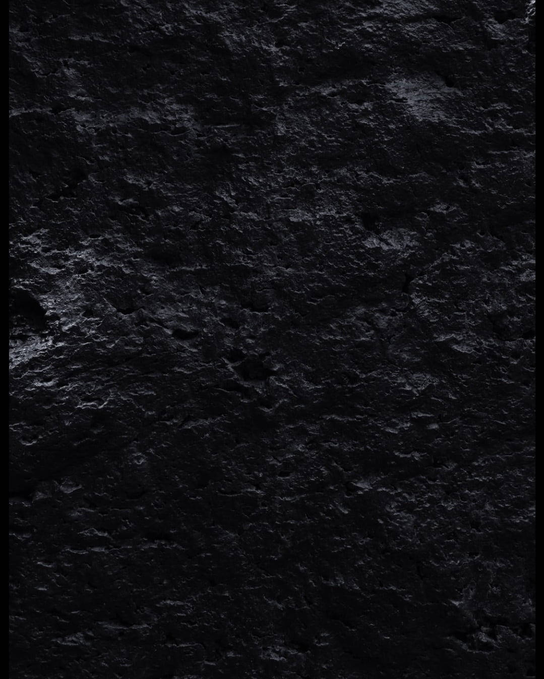 Dark Wall With Rocky Texture Wallpaper