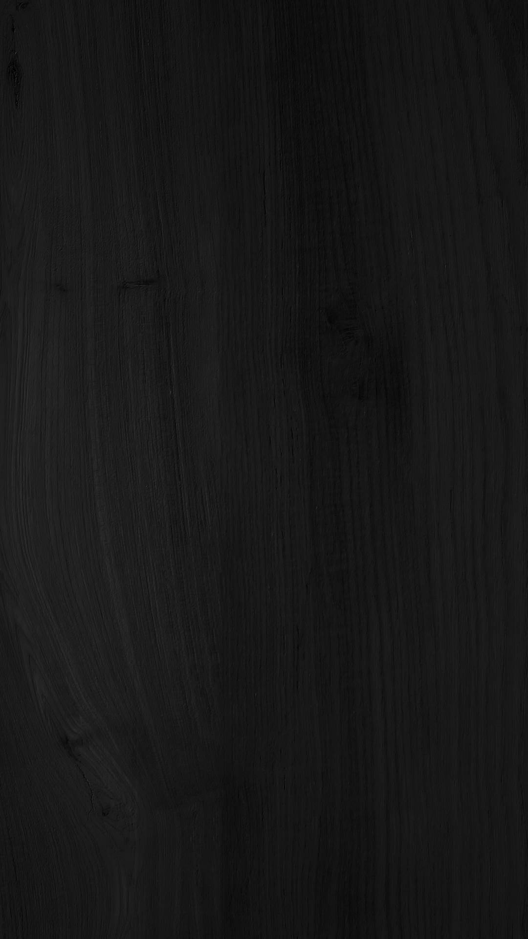 Caption: Enigmatic Wooden Panel Wall in Darkness Wallpaper