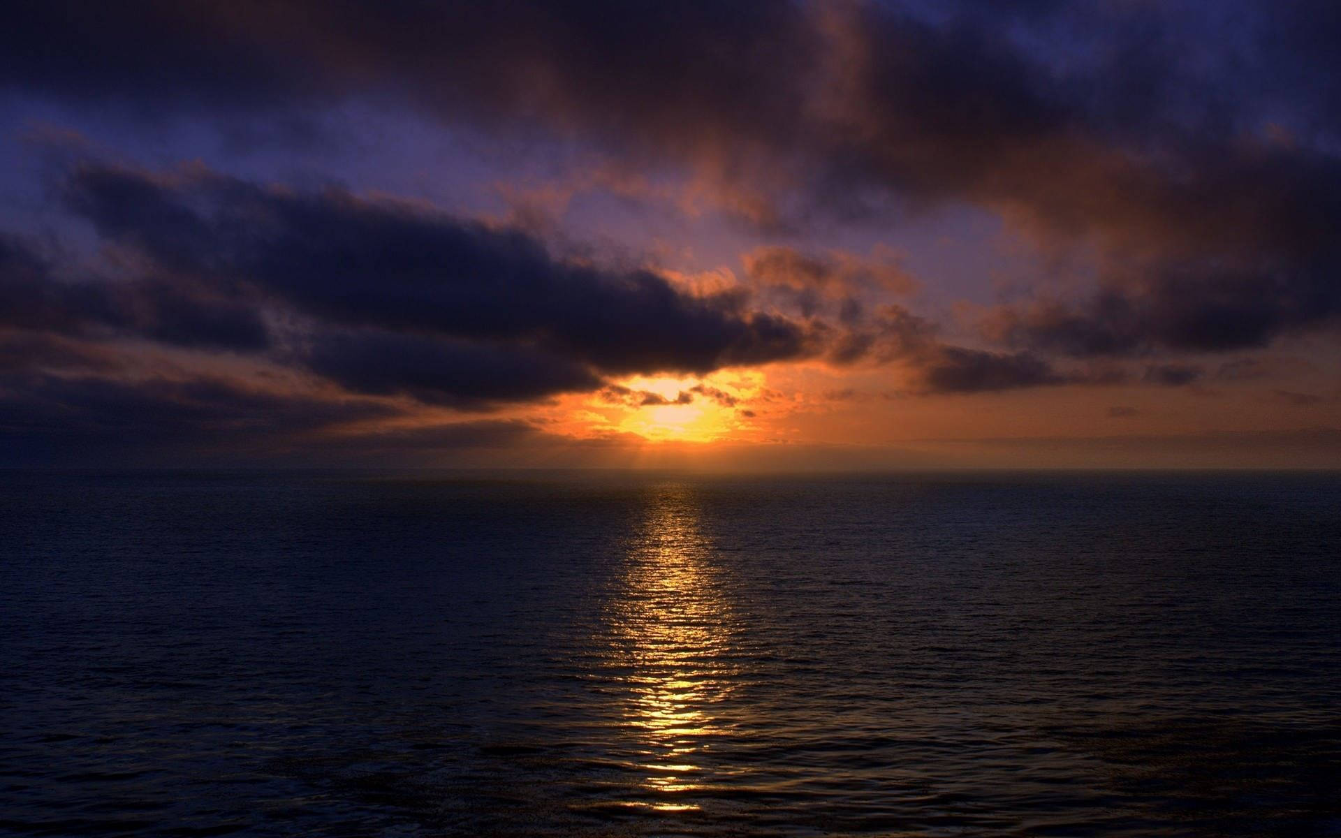 Darkening Sunset Ocean Wallpaper