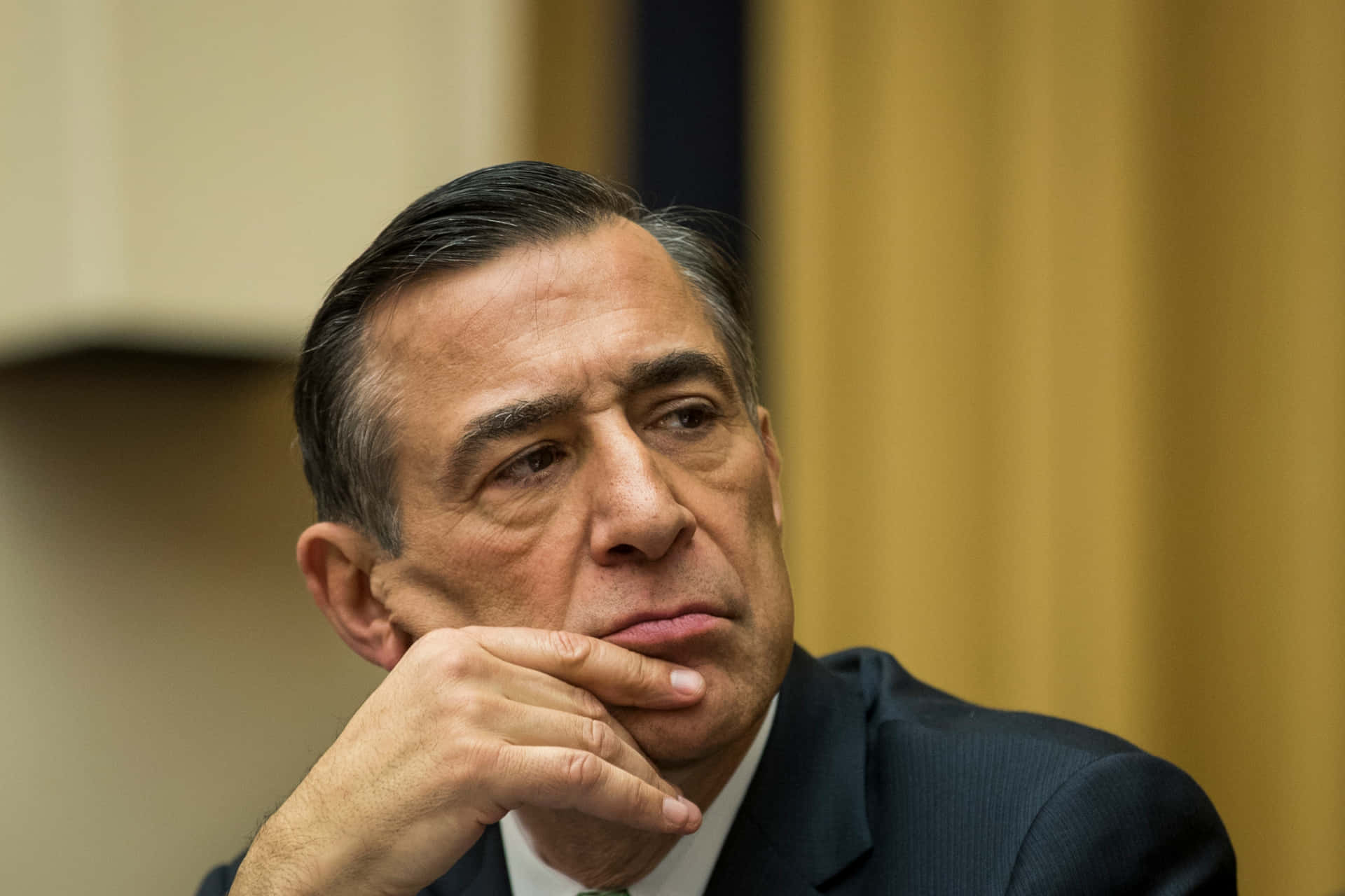 Darrell Issa With Hand On Chin Wallpaper