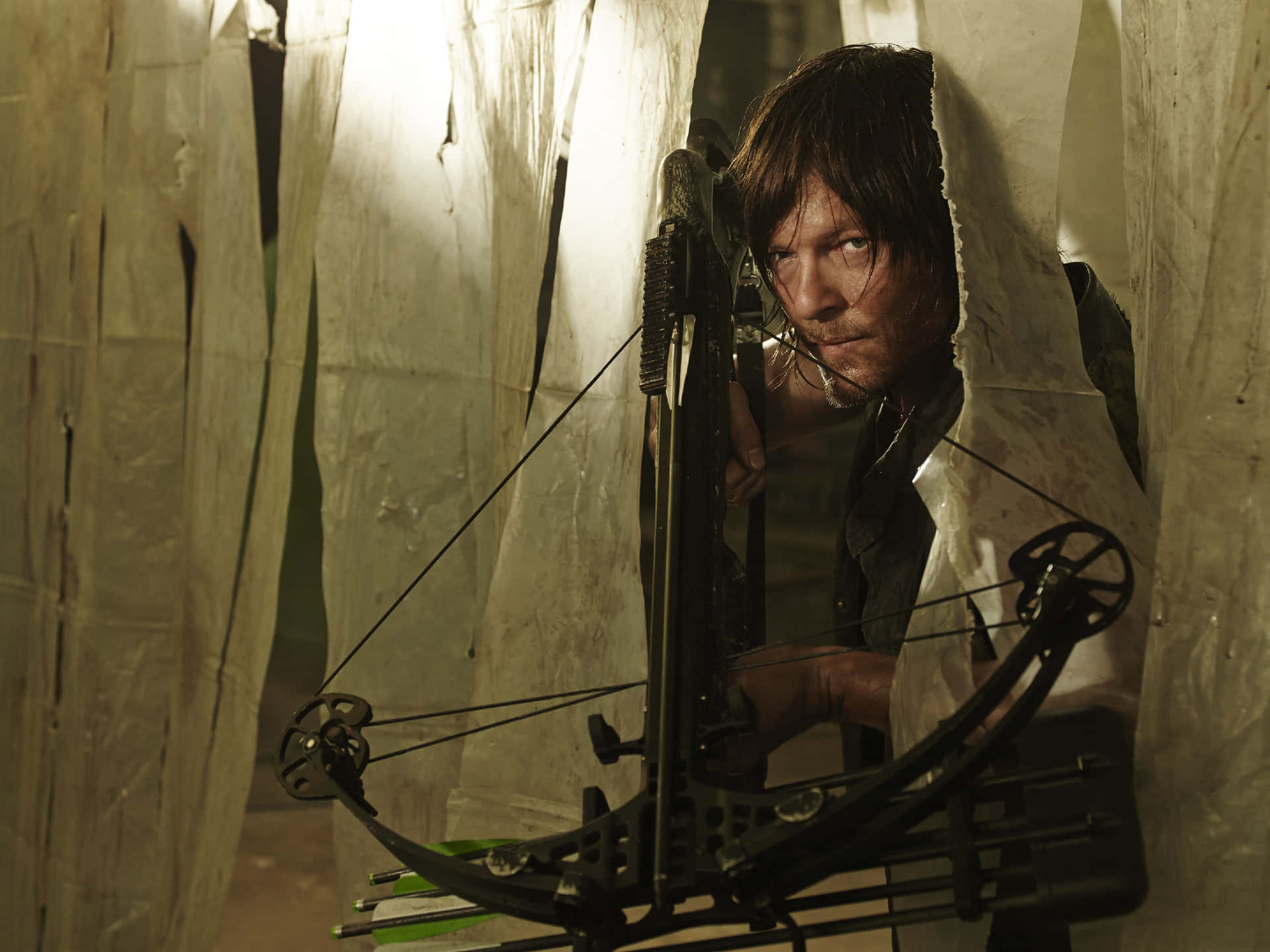 Daryl Dixon With Crossbow Wallpaper