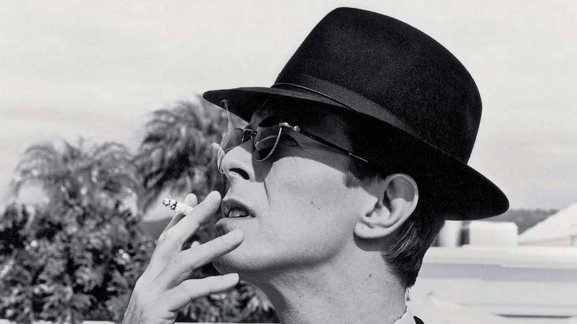 David Bowie With Hat And Sunglasses Background