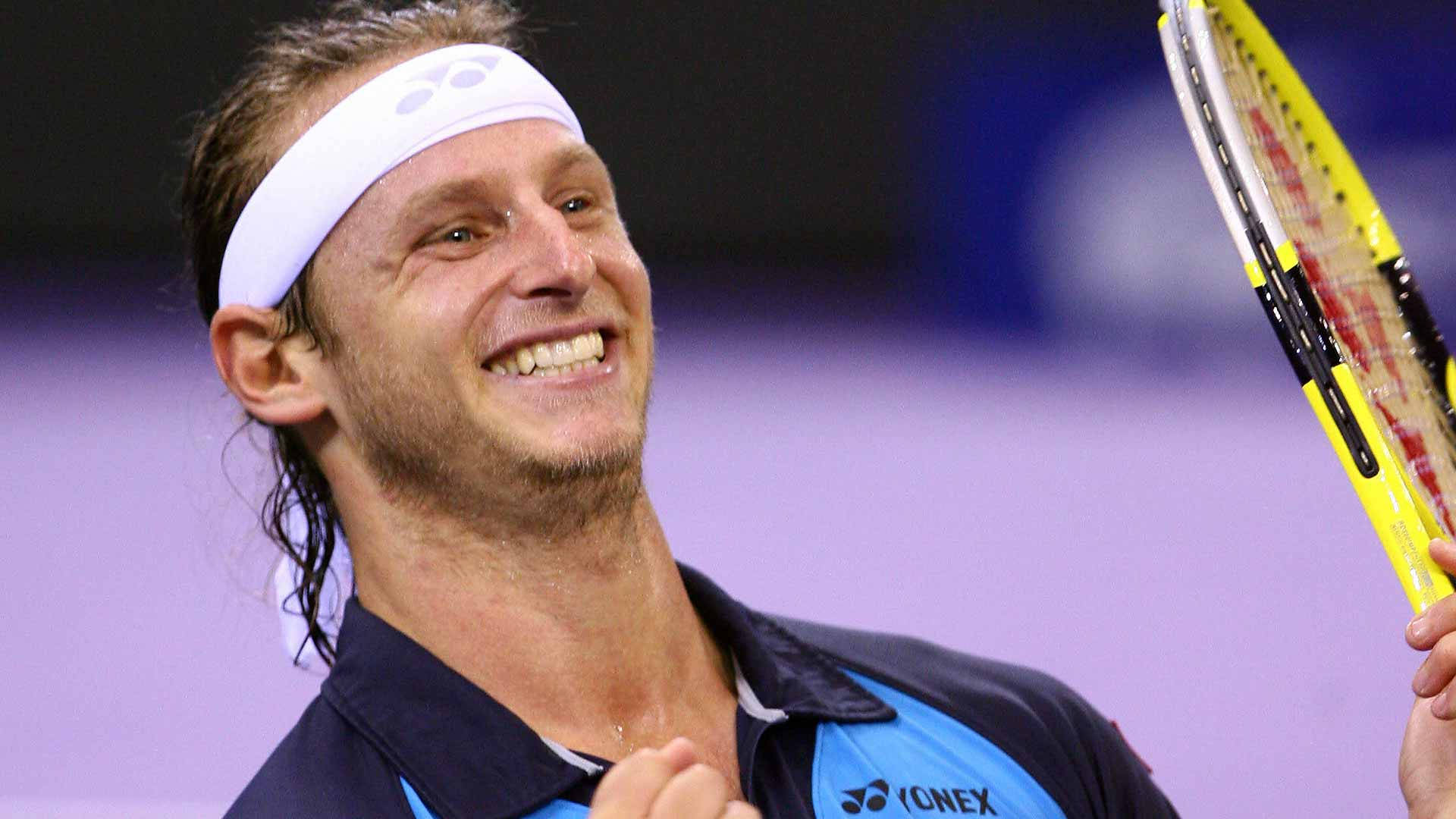 Caption: Tennis Star David Nalbandian's Winning Smile Wallpaper