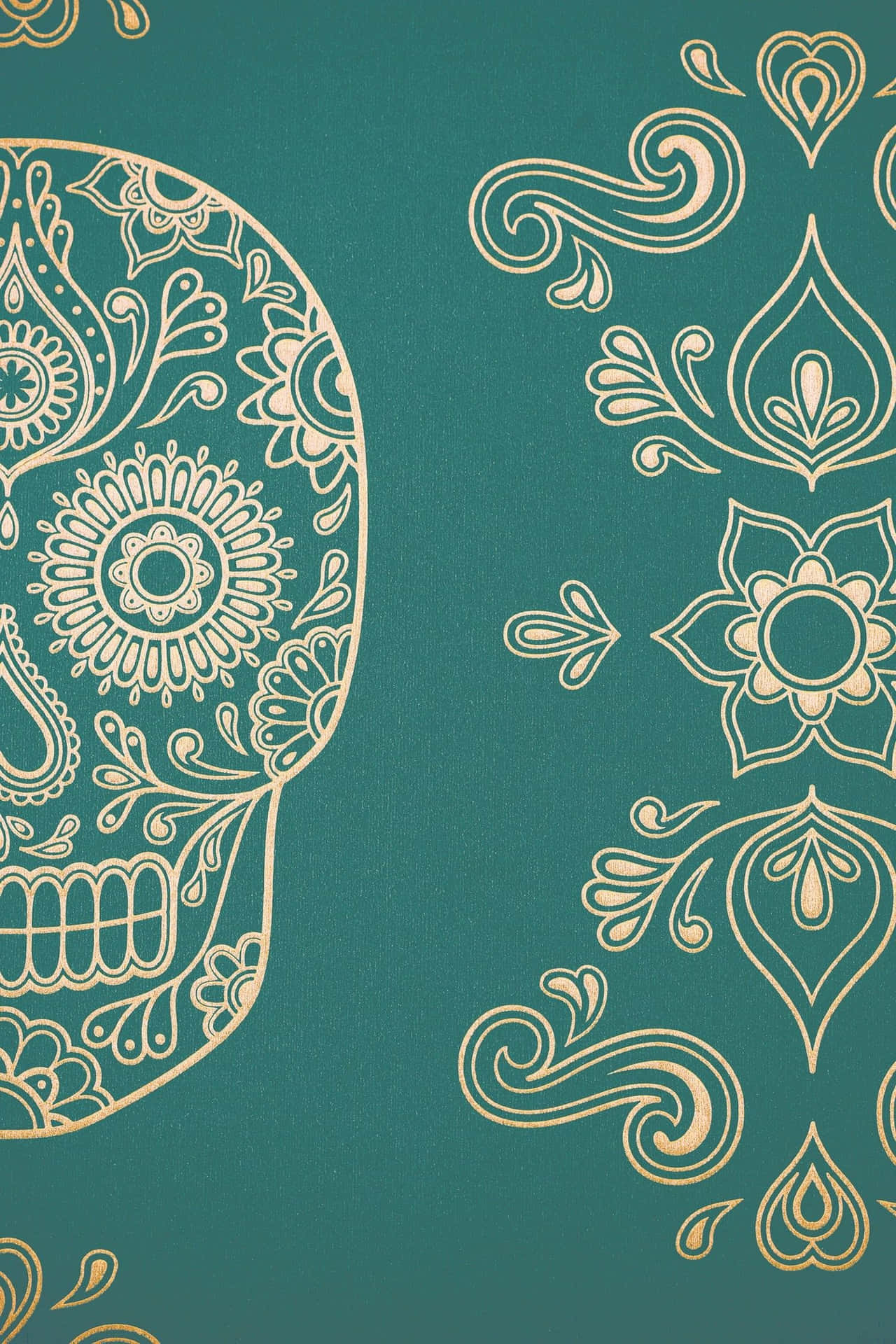 A Gold Sugar Skull On A Teal Background