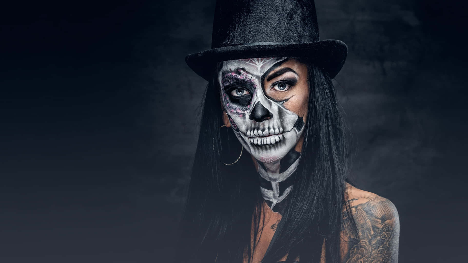 A Woman With Skeleton Makeup And A Top Hat