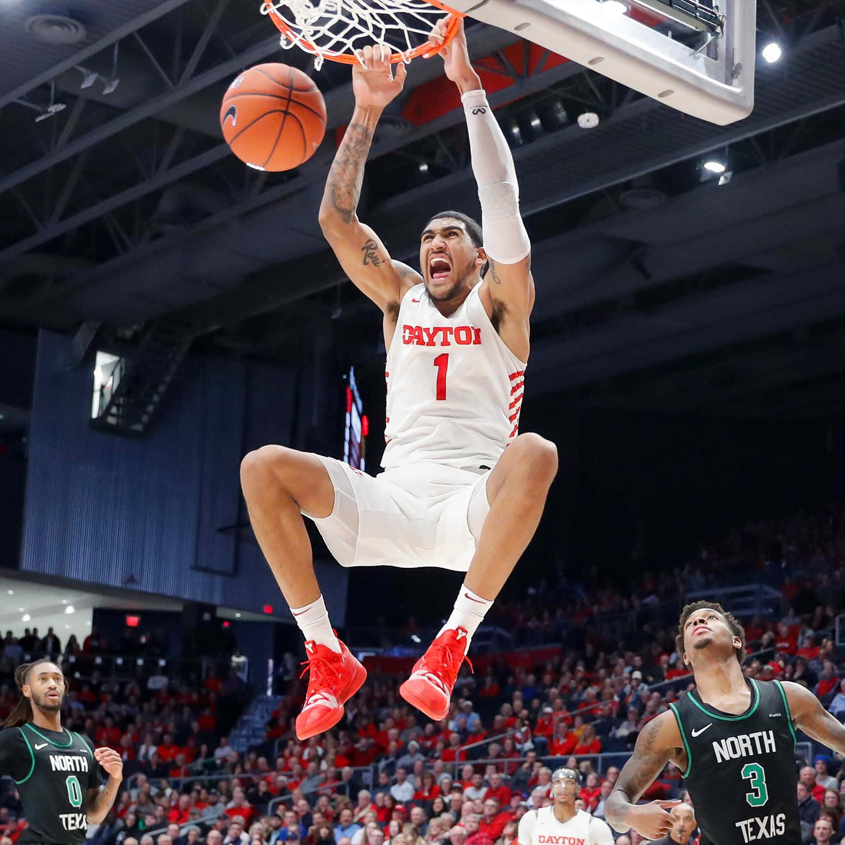 Dayton Basketball Player Dunking Wallpaper