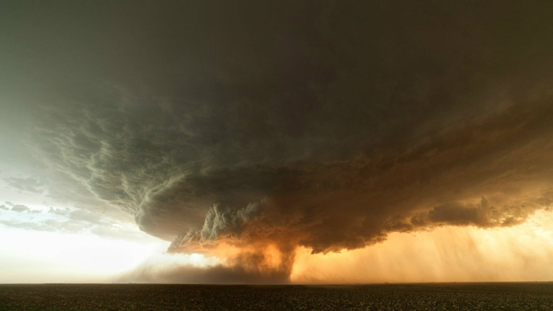 A Deadly Land-Spouts Tornado Roaring through the Vast Plains Wallpaper