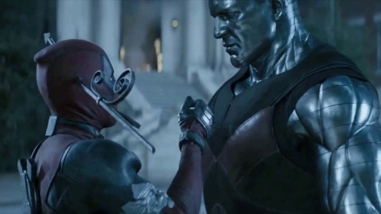 Deadpool and Colossus Unite: An Epic Marvel Moment Wallpaper