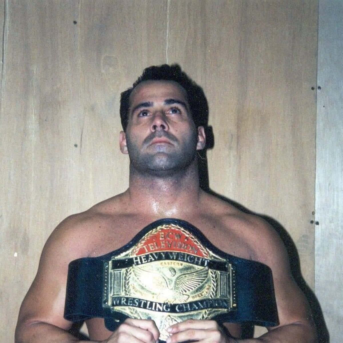Dean Malenko Holding Ecw Heavyweight Belt Wallpaper