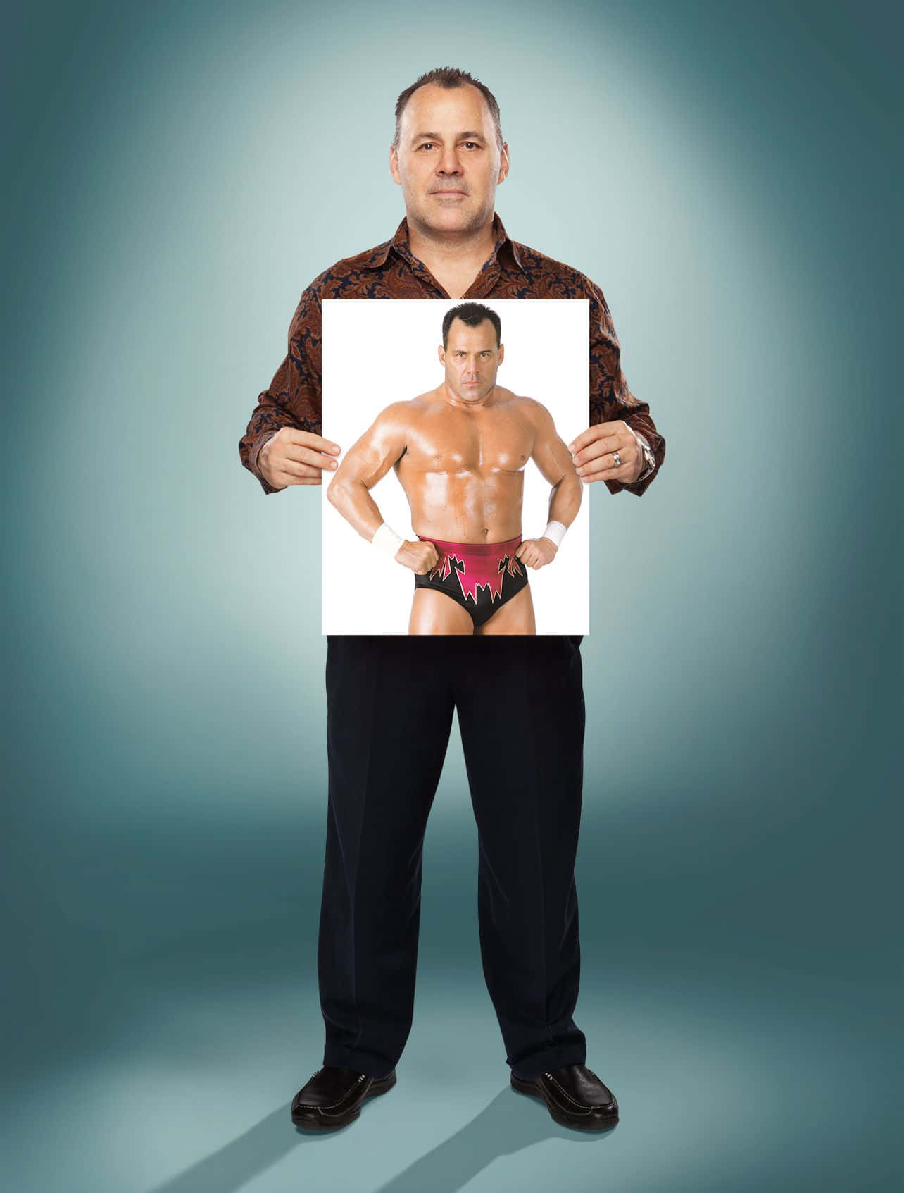 Dean Malenko Holding Photo Of Younger Self Wallpaper