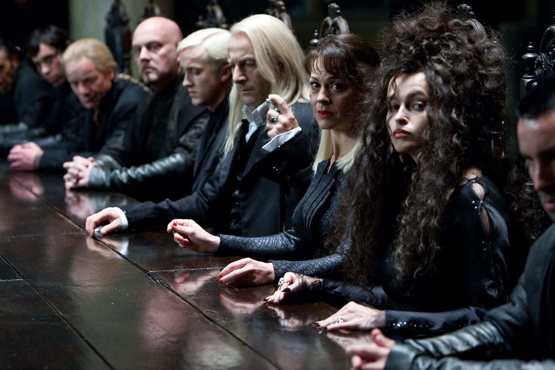 Dark Gathering: A group of Death Eaters in striking formation Wallpaper