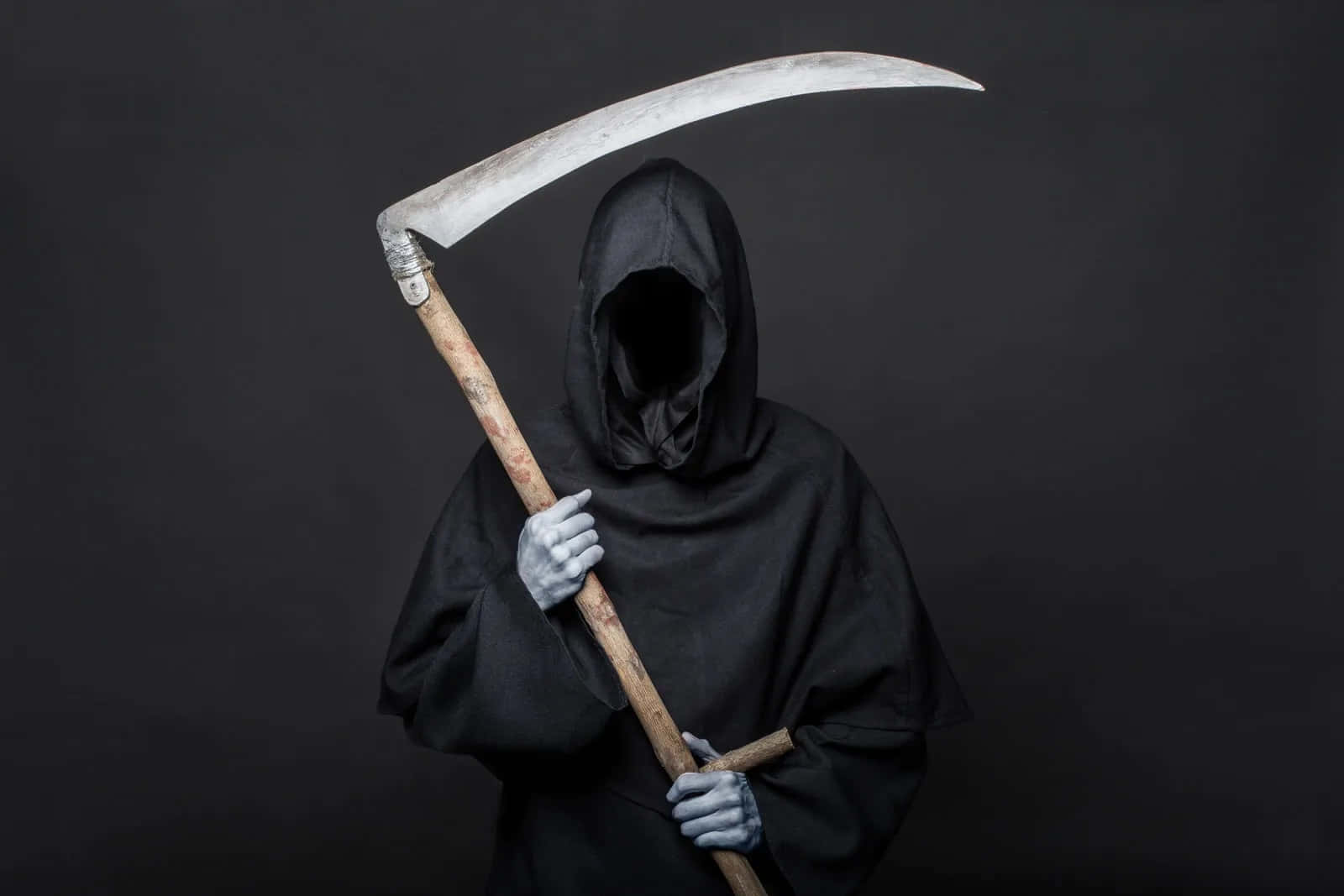 'The Grim Reaper: a grave reminder of life's impermanence.'