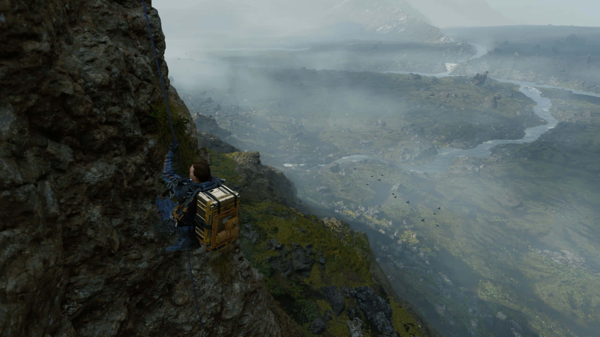En mand klatrer en klippe i et videospil Wallpaper