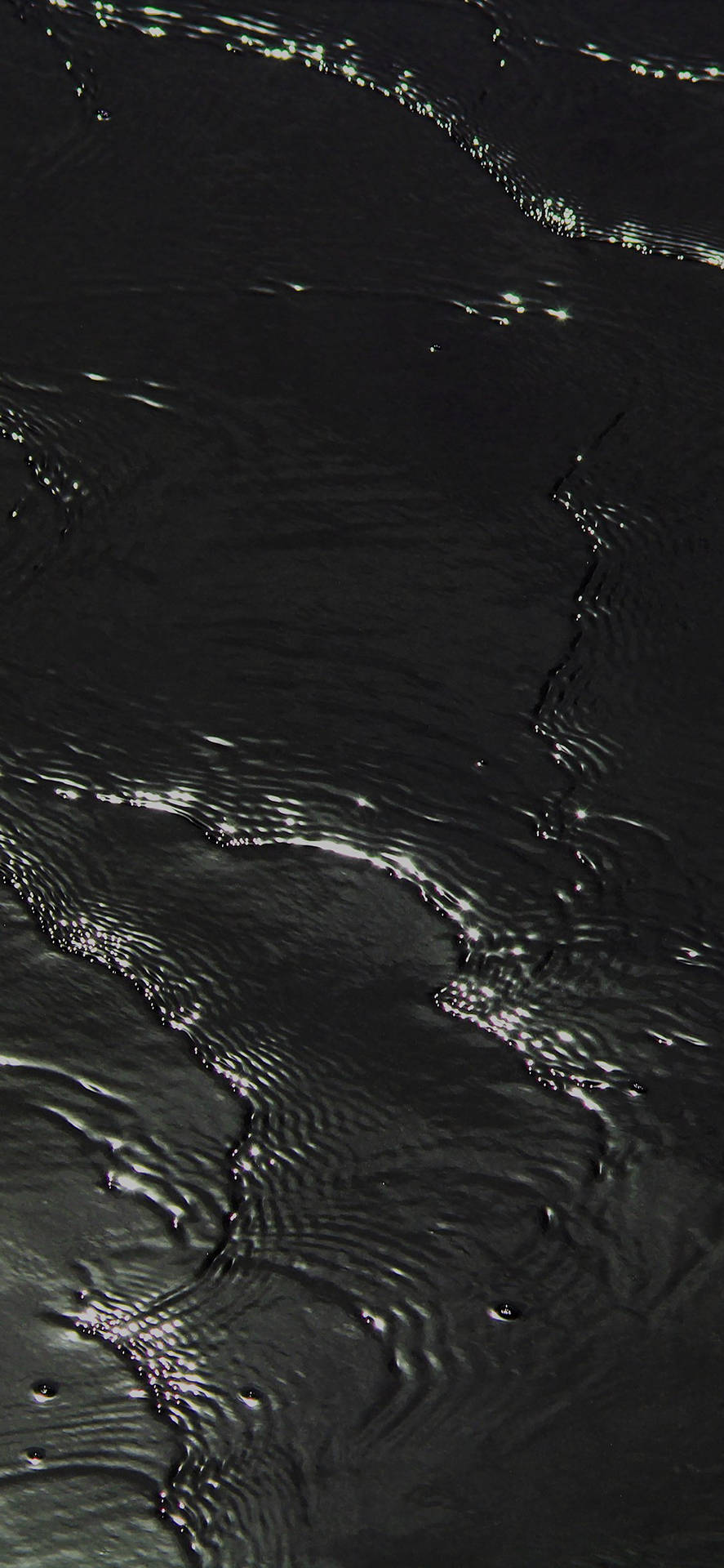 Deep Black Rippling Water Wallpaper
