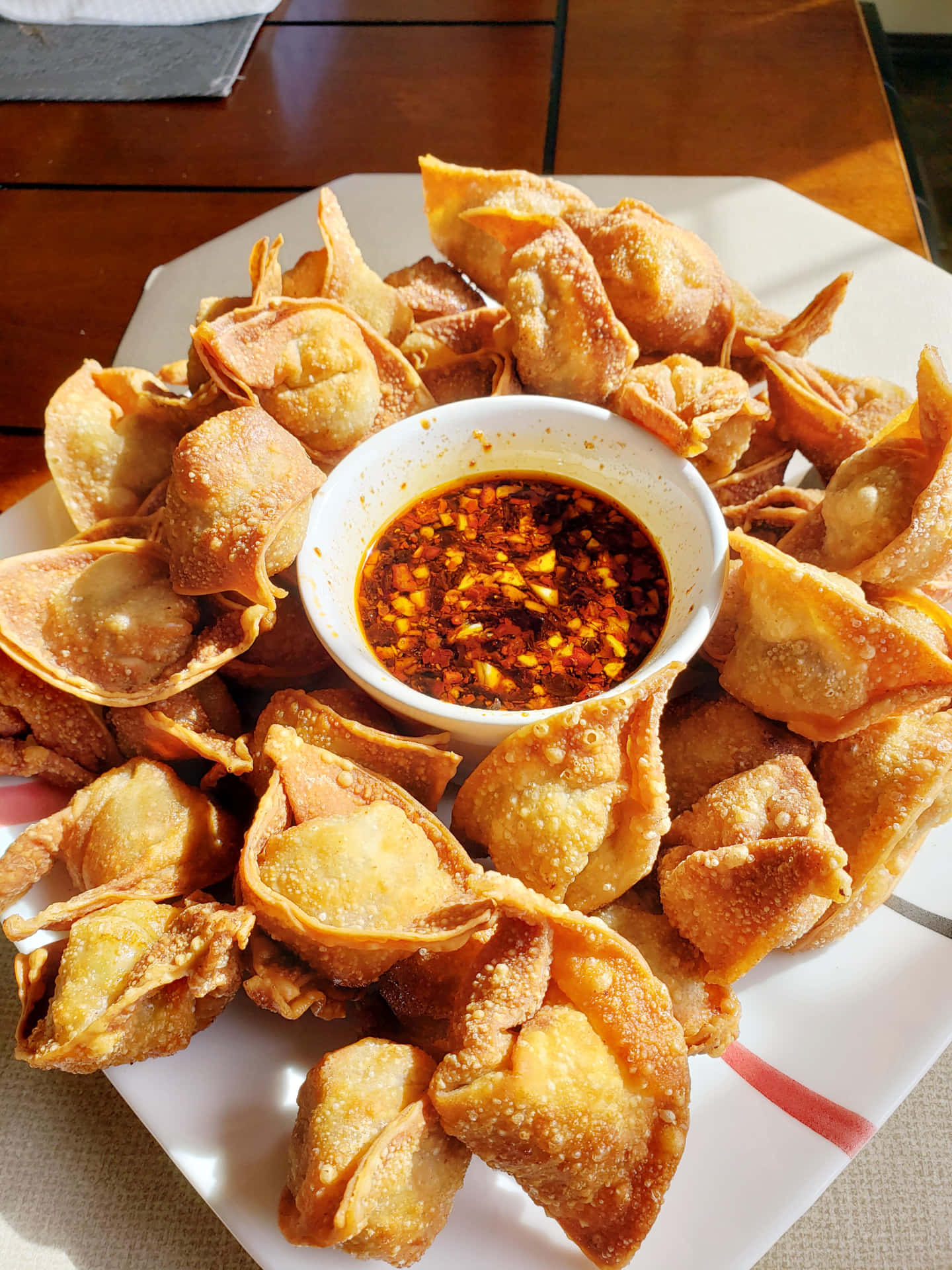 A Plate Of Fried Dumplings
