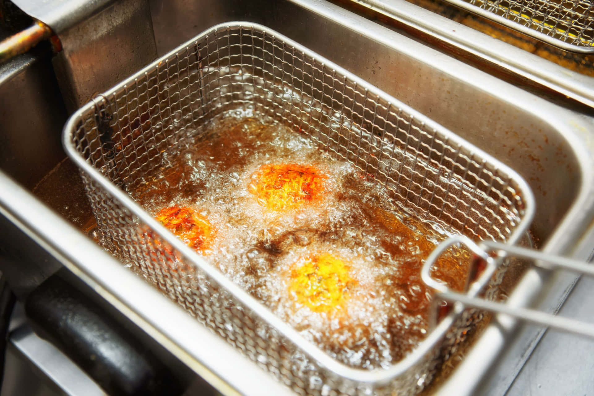 Fried Eggs In A Metal Basket