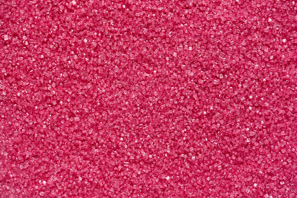 Aesthetic Deep Pink Crystal Beads Sparkling in the Light Wallpaper