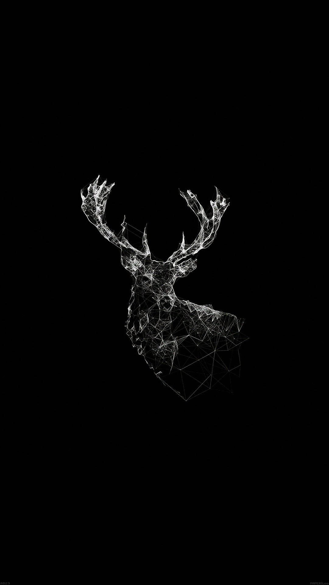 A Deer With Horns On A Black Background Wallpaper